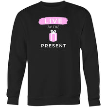 Load image into Gallery viewer, Discover our women's relaxed fit sweatshirt featuring the inspiring slogan 'Live in the Present.' This fashionable oversized sweatshirt offers ultimate comfort, making it the perfect addition to your casual wardrobe. Embrace effortless style and stay cosy while promoting a positive mindset. Upgrade your collection today!