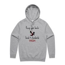 Load image into Gallery viewer, Stay stylish and empowered with our fashionable oversized women's hoodie featuring the inspiring message 'Keep your heels, head, and standards high.' This modern, relaxed-fit hoodie combines comfort with a bold statement, perfect for adding a chic touch to your everyday wardrobe.