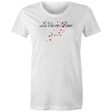 Load image into Gallery viewer, Embrace positivity with our women's 100% organic t-shirt featuring the message 'La Vie en Rose.' This eco-friendly, top-quality tee is made from organic cotton, offering a premium, sustainable choice for the environmentally conscious. Perfect for those who value style and sustainability.