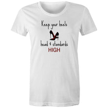 Load image into Gallery viewer, Stay stylish and eco-conscious with our women's 100% organic cotton t-shirt featuring the empowering message, 'Keep Your Heels, Head, and Standards High.' Crafted from premium, sustainable materials, this eco-friendly tee combines fashion and values for the best organic clothing choice.