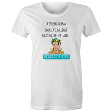 Load image into Gallery viewer, Stand tall with this t-shirt featuring the empowering quote: 'A Strong Woman Looks a Challenge Dead in the Eye and Gives It a Wink.' Our positive message t-shirts are designed to spread confidence and uplift spirits with every wear, making them a must-have for women who embrace their strength and resilience.