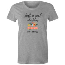 Load image into Gallery viewer, Embrace your wanderlust with this retro-inspired 'Just a Girl Who Loves to Travel' graphic t-shirt, designed for adventurous souls. Whether you're jet-setting to a new destination or dreaming of your next journey, this iconic design adds a timeless touch to your wardrobe. A must-have women's tee for travel lovers!