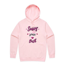 Load image into Gallery viewer, Stay comfy and confident in our relaxed fit ‘Sassy Since Birth’ hoodie. A bold statement piece designed for ultimate comfort and unapologetic attitude.