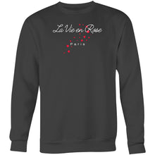 Load image into Gallery viewer, Stay cosy in our women's relaxed fit sweatshirt featuring the uplifting message 'La Vie en Rose.' This comfortable, oversized sweatshirt combines modern style with a relaxed fit, perfect for adding a touch of positivity to your wardrobe. Ideal for those who love stylish, laid-back fashion.