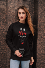 Load image into Gallery viewer, Wrap yourself in the message of self-love with our 'Be You-tiful' relaxed fit sweatshirt. Designed to celebrate your unique individuality, this cosy and stylish sweatshirt is a daily reminder to embrace and express your true self with confidence and comfort.