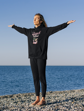 Load image into Gallery viewer, Embrace the essence of summer with our 'Beach Vibes' relaxed fit hoodie. Ideal for cool evenings, this hoodie is your go-to for summer nights, beach barbecues, and sunset watching. With an oversized fit and cosy pocket, it keeps you warm and stylish, embodying the laid-back beach lifestyle in every detail.