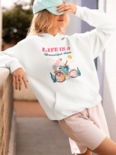Load image into Gallery viewer, Embrace comfort and style with our fashionable oversized women's hoodie, featuring a relaxed fit and the inspiring slogan 'Life is a beautiful ride.' Perfect for a modern look, this premium hoodie offers cosy vibes while keeping you effortlessly chic. Shop now for your go-to casual staple!