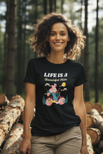 Load image into Gallery viewer, Discover our women's 'Life is a Beautiful Ride' T-shirt, featuring an empowering quote to inspire positivity. This affirmation tee blends style with an inspirational message, perfect for those seeking motivational T-shirts with uplifting, positive quotes. Wear your inspiration with pride!