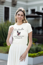 Load image into Gallery viewer, Celebrate the magic of the Cinderella story with our women's t-shirt, featuring the inspiring message "Cinderella - proof that a new pair of shoes can change your life!" Perfect for fans of uplifting slogan t-shirts, this enchanting tee combines the classic fairytale with a stylish, empowering twist.