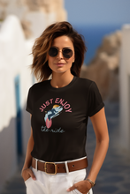 Load image into Gallery viewer, Embrace positivity with our 'Enjoy the Ride inspirational t-shirt. This inspirational graphic tee spreads positive vibes with its motivational message. Perfect for those who love uplifting t-shirts, it’s a stylish reminder to live in the moment and enjoy life’s journey.