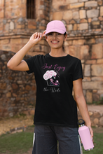 Load image into Gallery viewer, Embrace eco-friendly fashion with our 'Just Enjoy the Ride' 100% organic t-shirt. Made from premium organic cotton, this sustainable tee offers comfort and style while spreading a positive message. Perfect for those who value high-quality, sustainable fashion choices.