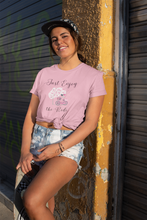 Load image into Gallery viewer, Discover our 'Enjoy the Ride' affirmation t-shirt, an inspirational graphic tee that spreads positive vibes wherever you go. Perfect for those who embrace life’s journey, this motivational t-shirt features a bold message to inspire yourself and others. Shop now for uplifting, positive quotes!