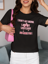 Load image into Gallery viewer, Show off your playful side with our women's t-shirt featuring the witty message 'I don't get drunk, I just get less classy and more fun!' Perfect for fans of funny message t-shirts, this humorous and quirky tee adds a touch of humour to your wardrobe with its laugh-out-loud catchphrase.
