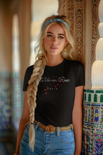 Load image into Gallery viewer, Discover our women's t-shirt featuring the uplifting message 'La Vie en Rose.' This empowering tee brings positive vibes with its inspirational message, perfect for those who love affirmation t-shirts and motivational slogans. Wear it to spread positivity and embrace an optimistic outlook.