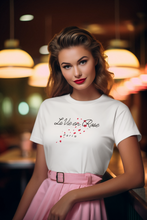 Load image into Gallery viewer, Embrace positivity with our women's 100% organic t-shirt featuring the message 'La Vie en Rose.' This eco-friendly, top-quality tee is made from organic cotton, offering a premium, sustainable choice for the environmentally conscious. Perfect for those who value style and sustainability.