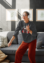 Load image into Gallery viewer, Stay cosy and stylish with our women's 'Live Life Loud' relaxed fit sweatshirt. Perfect for modern, laid-back fashion, this oversized sweatshirt offers unbeatable comfort and style. Discover comfortable, trendy sweatshirts that make a bold statement today!