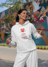Load image into Gallery viewer, Stay cosy and stylish with our women's relaxed fit hoodie featuring the uplifting 'Live, Love, Laugh' message. This fashionable oversized hoodie offers a modern, casual look, perfect for everyday wear. Embrace comfort and style in our trendy women's hoodies.