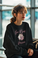 Load image into Gallery viewer, Stay stylish and comfortable with our women's relaxed fit sweatshirt, featuring the empowering slogan "Live Your Passion." This modern, oversized design offers the perfect blend of fashion and comfort. Ideal for casual days, this trendy sweatshirt is a must-have for your wardrobe.