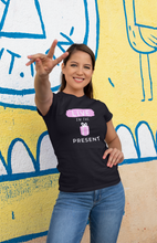 Load image into Gallery viewer, Embrace mindful living with our 100% organic cotton t-shirt, featuring the inspiring message "Live in the Present." Crafted from eco-friendly materials, this premium sustainable tee offers comfort and style. Shop now for high-quality organic cotton clothing that’s both chic and planet-friendly!