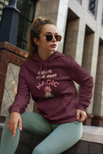 Load image into Gallery viewer, Unleash your potential with our 'Create Your Own Magic' hoodie. This cosy, oversized hoodie is more than just streetwear; it’s a statement. With a relaxed fit and fashionable design, it's the perfect blend of comfort and inspiration, reminding you to create your own magic every day!