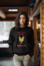 Load image into Gallery viewer, Stay cosy and stylish in our women's relaxed fit sweatshirt with the fun slogan 'I'm Just Here for the Mimosas.' This fashionable oversized sweatshirt offers comfort and a trendy look, perfect for casual days. Shop now for the ultimate in comfortable, oversized women's sweatshirts!