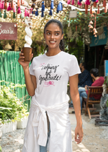 Load image into Gallery viewer, Discover our women's t-shirt featuring the empowering quote "Nothing But Gratitude." This inspirational message tee offers motivational and positive vibes, making it a perfect addition to your collection of uplifting slogan apparel. Spread positivity and embrace good vibes with this must-have piece.