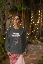 Load image into Gallery viewer, Embrace comfort and style with our women's relaxed fit sweatshirt featuring the empowering message 'Shine Bright Like a Diamond.' This modern, fashionable oversized sweatshirt is perfect for those who value both comfort and trend-setting style. Elevate your wardrobe with this must-have piece.