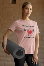 Load image into Gallery viewer, Embrace positivity with our women's t-shirt featuring the empowering message 'Stay Strong and Power On.' This inspirational graphic tee is perfect for spreading motivation and uplifting vibes. Shop our affirmation t-shirts for women and wear your strength with pride through empowering quotes.
