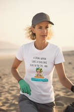Load image into Gallery viewer, Embrace strength and style with our 100% organic cotton t-shirt featuring the empowering message: 'A Strong Woman Looks a Challenge Dead in the Eye and Gives It a Wink.' This eco-friendly, premium sustainable tee is perfect for the environmentally conscious, offering top-quality comfort and inspiration.