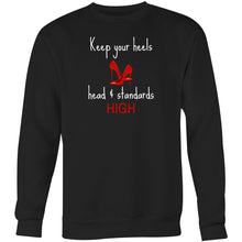Load image into Gallery viewer, Stay cosy and stylish in our women's oversized sweatshirt featuring the empowering slogan, 'Keep Your Heels, Head, and Standards High.' This relaxed-fit sweatshirt offers ultimate comfort and modern fashion, making it the perfect choice for those seeking fashionable, comfortable everyday wear.