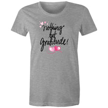 Load image into Gallery viewer, Discover our women's t-shirt featuring the empowering quote "Nothing But Gratitude." This inspirational message tee offers motivational and positive vibes, making it a perfect addition to your collection of uplifting slogan apparel. Spread positivity and embrace good vibes with this must-have piece.