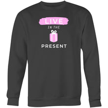Load image into Gallery viewer, Discover our women's relaxed fit sweatshirt featuring the inspiring slogan 'Live in the Present.' This fashionable oversized sweatshirt offers ultimate comfort, making it the perfect addition to your casual wardrobe. Embrace effortless style and stay cosy while promoting a positive mindset. Upgrade your collection today!