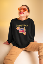 Load image into Gallery viewer, Stay cosy and stylish in our women's 'Good Vibes' sweatshirt. Designed with a relaxed fit, this fashionable oversized piece offers ultimate comfort. Perfect for those who love versatile, comfortable sweatshirts and trendy urban streetwear that spreads positivity everywhere.