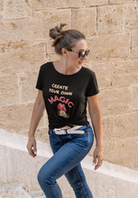 Load image into Gallery viewer, Empower your wardrobe with our women's t-shirt featuring the inspiring message 'Create Your Own Magic.' This high-quality, inspirational graphic t-shirt is perfect for those who love positive quotes and want to spread positivity. Make a statement with this must-have, empowering quote t-shirt.
