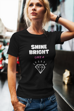 Load image into Gallery viewer, The 'Shine Bright Like a Diamond' women's t-shirt radiates positivity with its empowering message and uplifting slogan. Designed to inspire, this tee is perfect for spreading positive vibes wherever you go. This feel-good fashion piece serves as a daily reminder to shine brightly, empowering you to be your best self.
