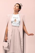 Load image into Gallery viewer, Stand out with our 'In a World Full of Trends, Remain a Classic' women's t-shirt. Made from 100% organic cotton, this eco-friendly tee offers premium sustainability and top-quality comfort. Embrace timeless style with our organic, environmentally conscious fashion choice.