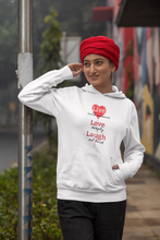 Load image into Gallery viewer, Elevate your casual street style with our women&#39;s regular fit hoodie, featuring the chic &#39;Live, Love, Laugh&#39; message. Part of our premium women&#39;s hoodie collection, this designer piece blends fashion and comfort effortlessly. Perfect for a fashionable, high-quality urban look.
