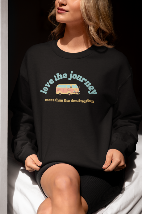 Stay stylish and comfortable in our women's relaxed fit sweatshirt featuring the empowering message, 'Love the Journey, More Than the Destination.' This modern, oversized sweatshirt combines fashion and comfort, making it perfect for everyday wear, or your next adventure.