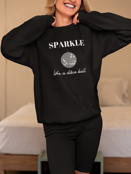 Stay cosy and chic in our women's sweatshirt featuring the slogan 'Sparkle Like a Disco Ball.' This modern, relaxed fit sweatshirt offers comfort and style, perfect for those who love fashionable oversized sweatshirts. Elevate your casual wardrobe with this must-have piece.