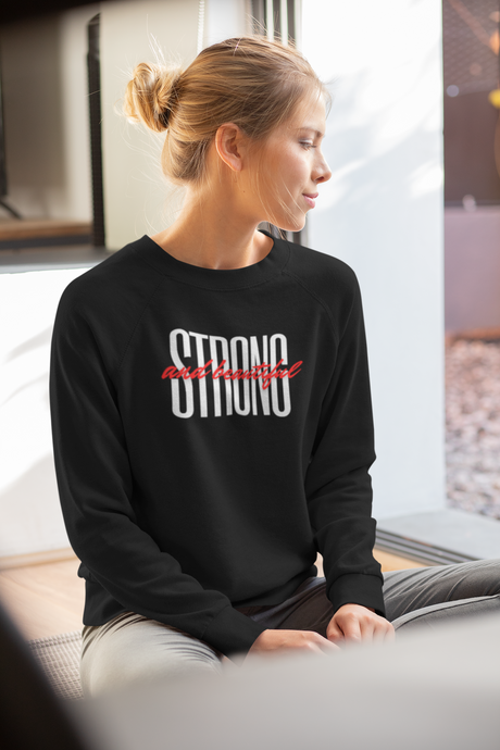 Embrace your inner strength with our Women's Relaxed Fit Sweatshirt featuring the empowering 'Strong & Beautiful' message. This modern, oversized sweatshirt combines comfort and style, reminding you to wear your confidence proudly. Perfect for everyday wear.