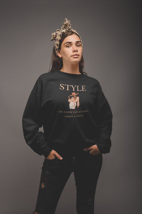 Discover our women's relaxed fit sweatshirt featuring the message 'Style—in a world full of trends, remain a classic.' This modern, fashionable oversized sweatshirt offers comfort and timeless elegance. Perfect for those who appreciate cosy yet stylish apparel that stands the test of time.